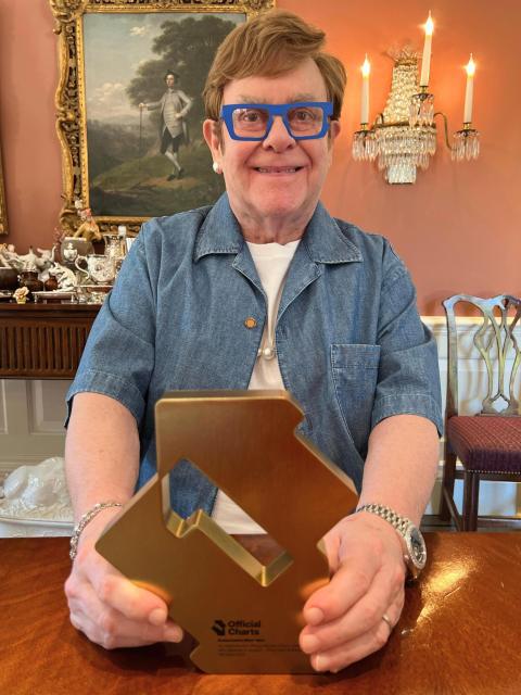 Elton John celebrates his Official Number 1 album Who Believes In Angels?